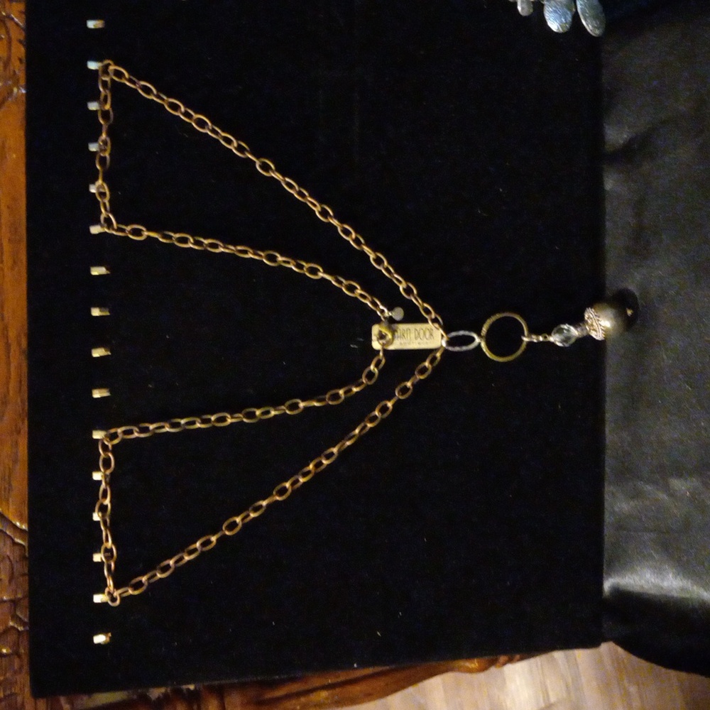 Industrial style oval link chain with pendant. Eye catching piece